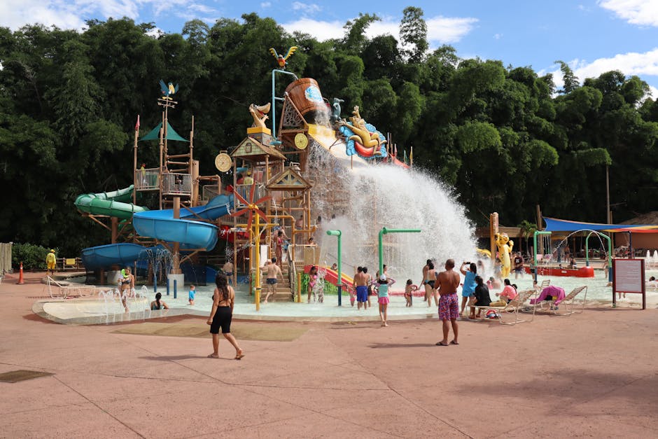 Children enjoying rides and games at an affordable amusement park, perfect for family vacations in the US